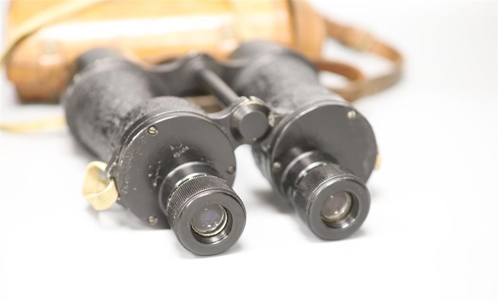 A pair of Bino Prism Mark IV x 7 register number 49604 WW2 binoculars in leather case